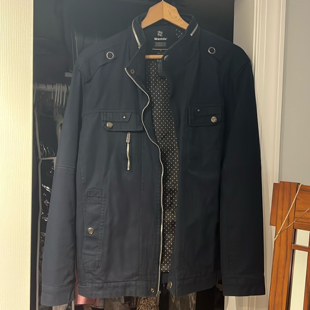Wantdo navy blue jean jacket. Never worn. Size medium